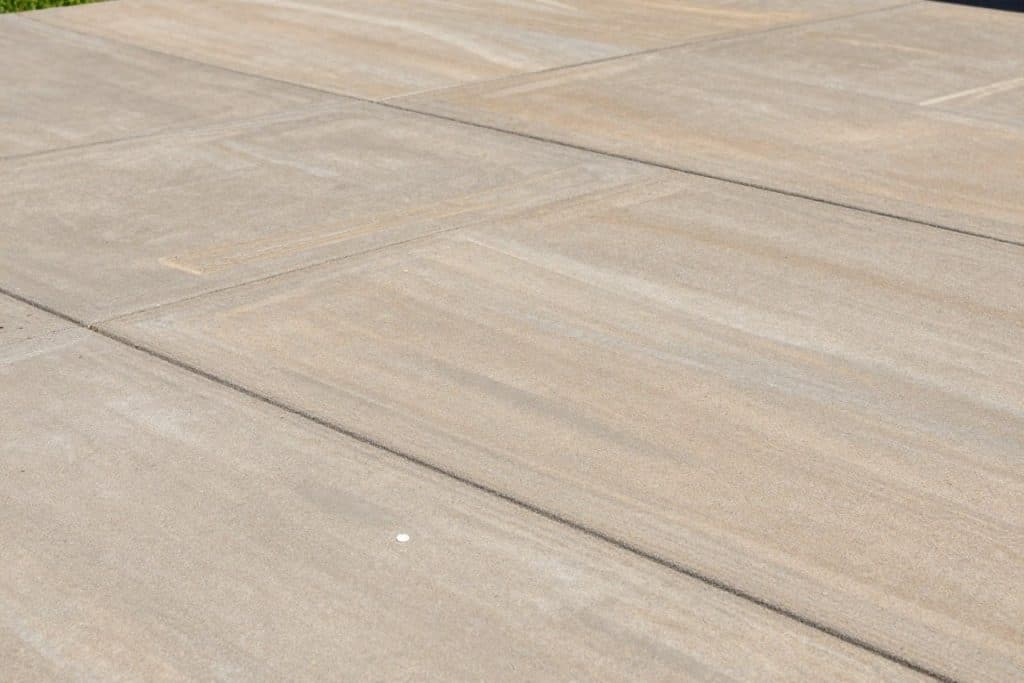 Stamped concrete patio pattern with blended earth-tone colors